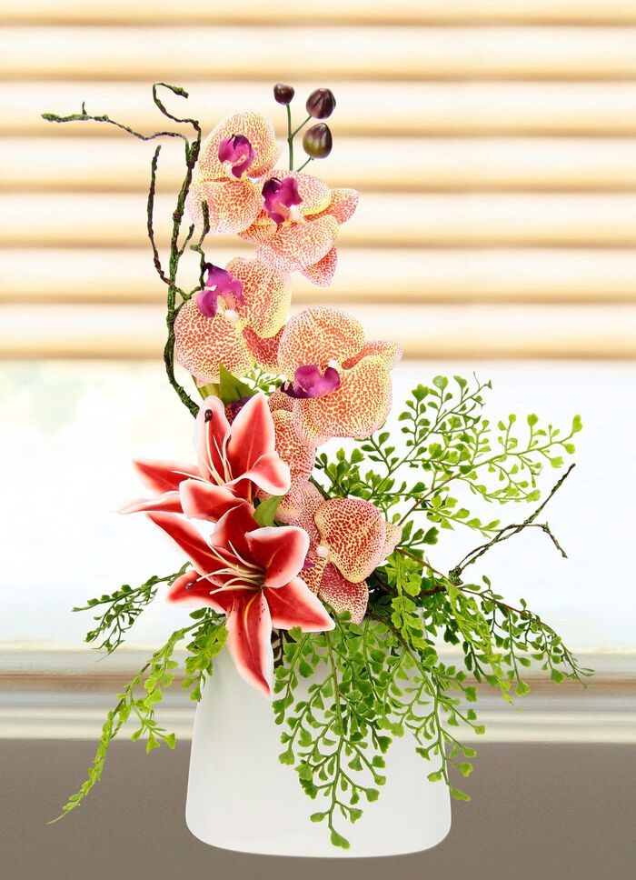 Bezauberndes Orchideen-Gesteck in Vase 
