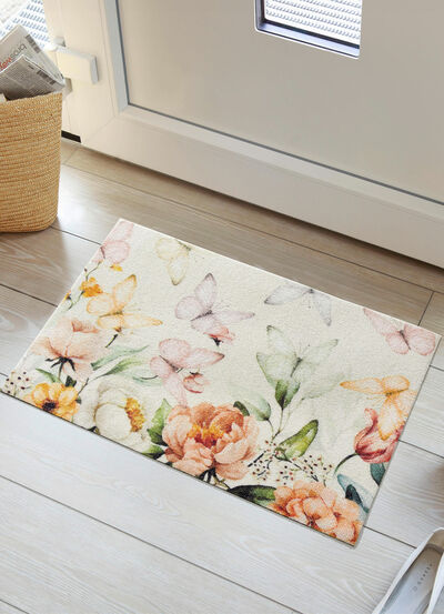 Ansprechende Fußmatte mit Blüten und Schmetterlinge 