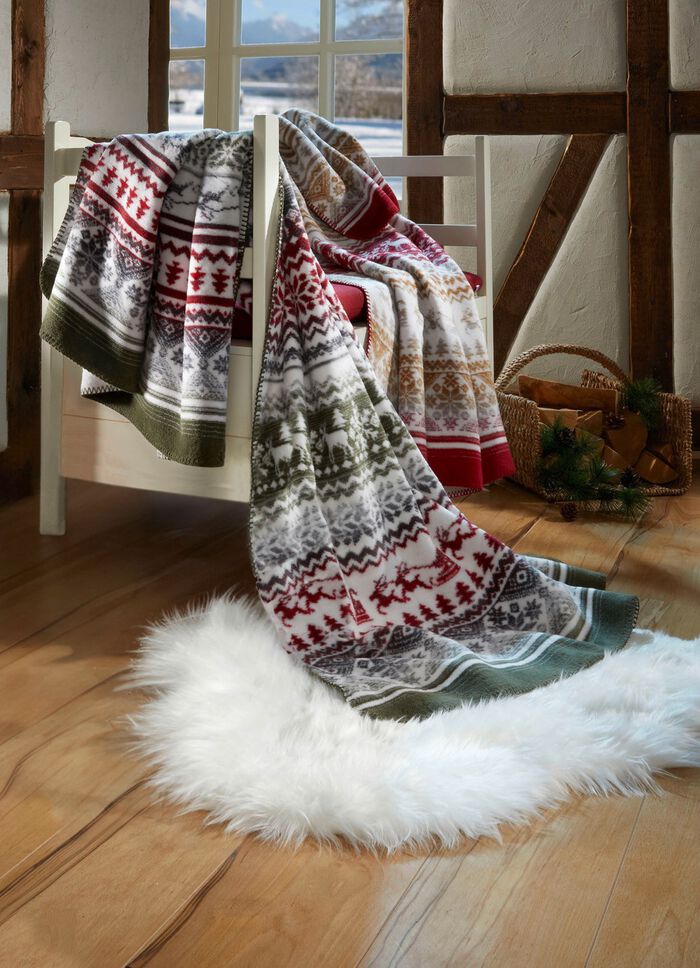 Kuschelige Wohndecke mit winterlichen Motiven GR&Uuml;N