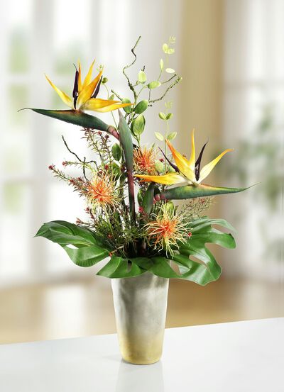 Strelitzien-Gesteck in Vase 