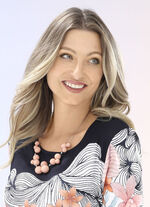 Hübsche Halskette mit pfirsichfarbenen Kugeln 