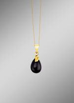 Exquisiter Anh&auml;nger aus Gold 375/- fein mit Onyx, beh. 
